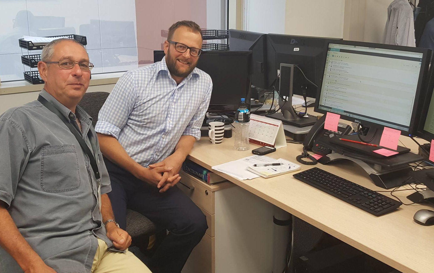 Simon Hoff (left) and Dave Williams in the AAP's Wellington bureau in New Zealand during Superdesk training.